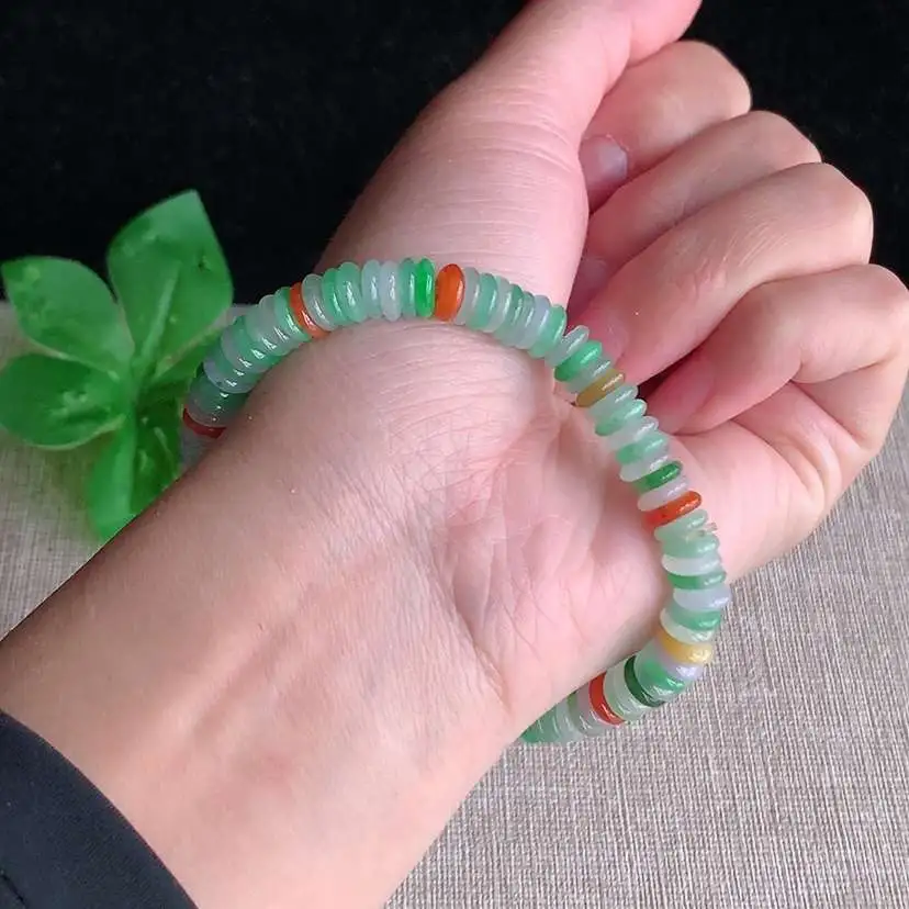 a货翡翠冰种多彩算盘珠手串  尺寸6.5×1.6mm 重量19.00g 0101