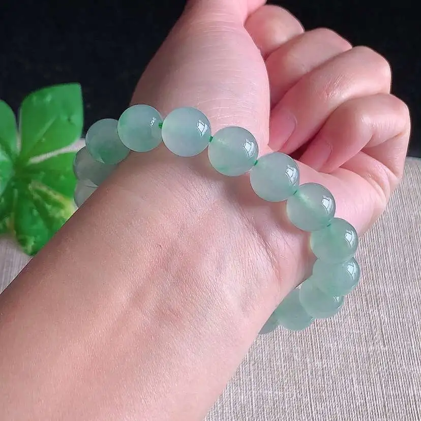 a货翡翠冰种晴水圆珠佛珠手串18颗 尺寸11mm 重量42.44g 1231