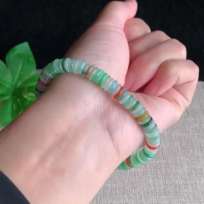 a货翡翠冰种多彩算盘珠手串  尺寸6.5×1.6mm 重量19.00g 0101