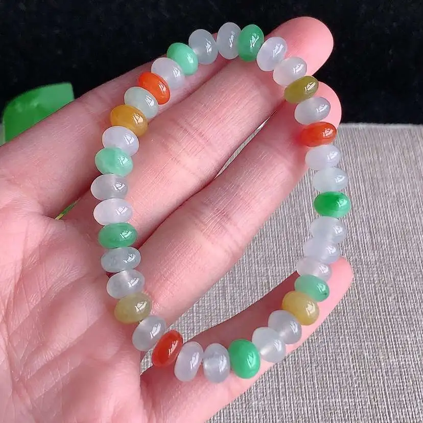 a货翡翠冰种多彩算盘珠手串36颗  尺寸7.2×4.4mm 重量18.80g 0101