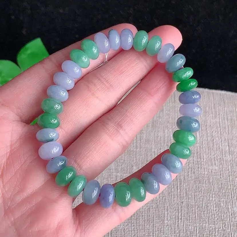 a货翡翠冰种满绿紫罗兰算盘珠手串33颗  尺寸8.8×5mm 重量26.30g 0101