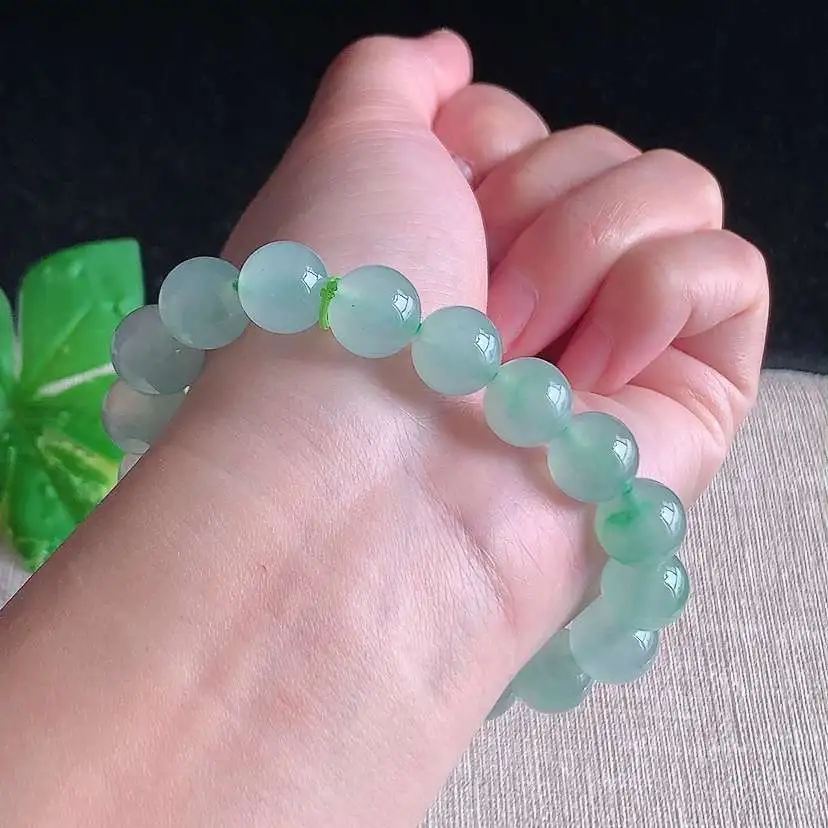 a货翡翠冰种晴水圆珠佛珠手串18颗 尺寸11mm 重量42.44g 1231