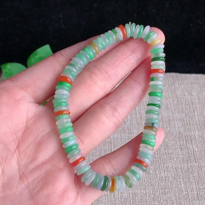 a货翡翠冰种多彩算盘珠手串  尺寸6.5×1.6mm 重量19.00g 0101