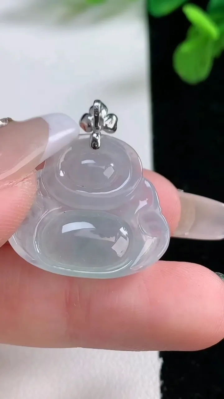 天然A货翡翠种飘花佛公吊坠，尺寸22.2-24.5-6.2，重量:4.99g
1月2日