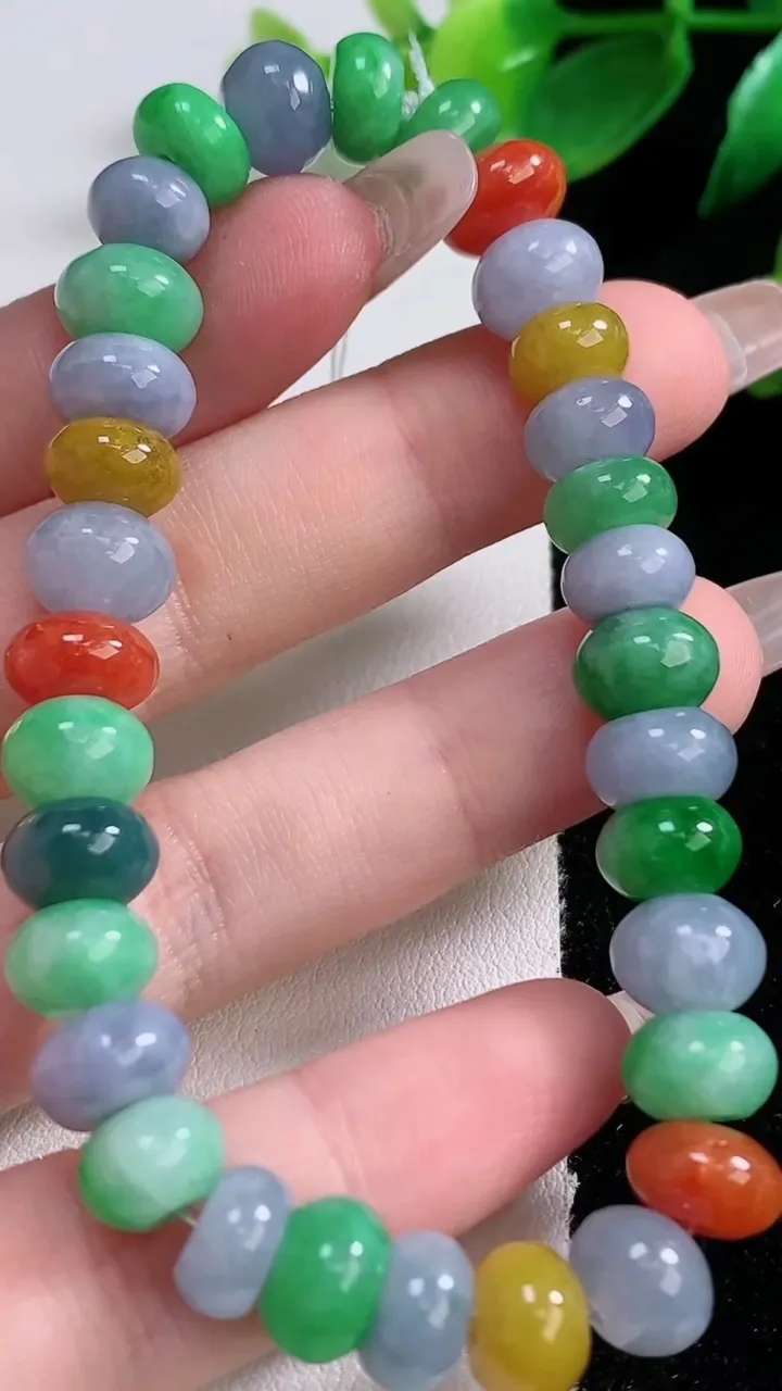 天然A货翡翠四彩算盘珠手串32颗，尺寸9.5-6.4，重量:29.25g1月3日
工厂直销收藏佳品,种好水足，色泽均匀，有种有色，上手高大气！