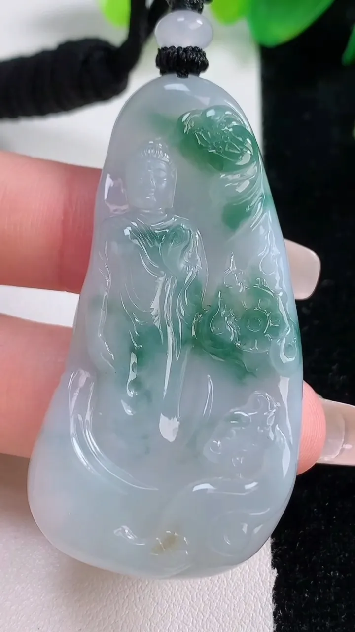天然A货翡翠冰种飘花阿弥陀佛吊坠，尺寸55.7-29.2-6.2，重量:25.32g
1月3日