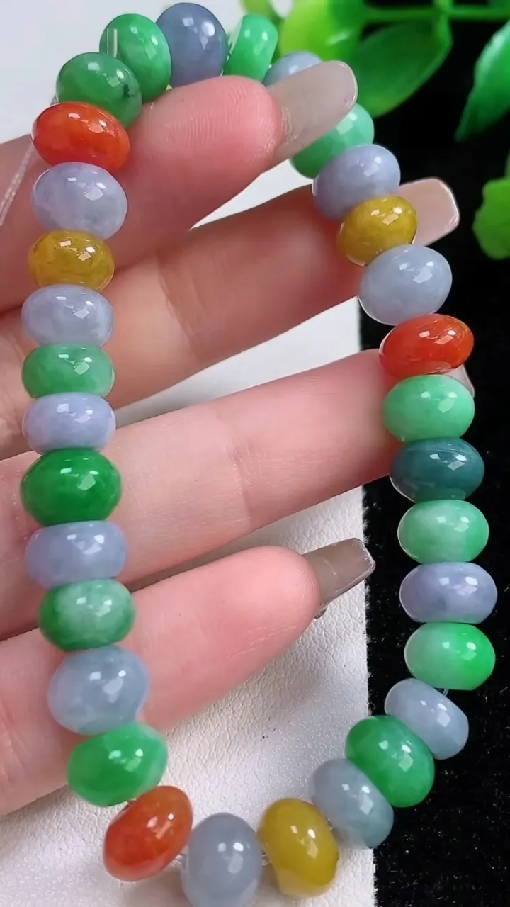 天然A货翡翠四彩算盘珠手串32颗，尺寸9.5-6.4，重量:29.25g1月3日
工厂直销收藏佳品,种好水足，色泽均匀，有种有色，上手高大气！