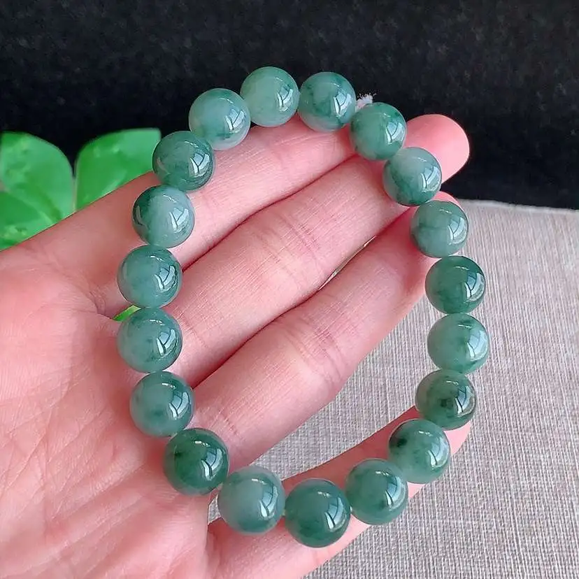 a货翡翠冰种飘花圆珠佛珠手串19颗  尺寸10mm 重量35.46g 0102