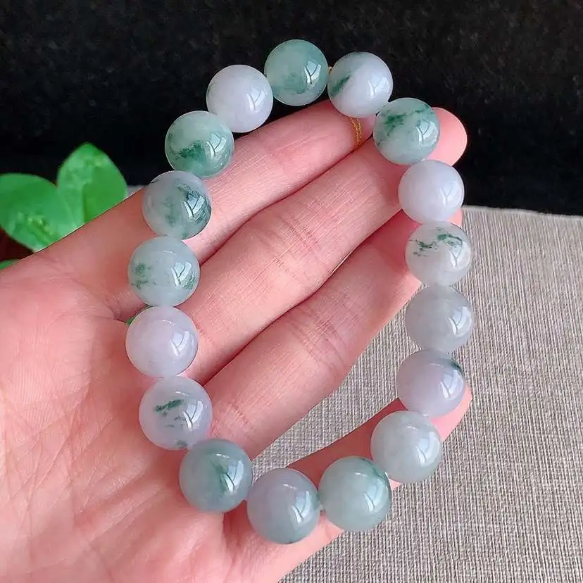 a货翡翠冰种飘花圆珠佛珠17颗  尺寸11.8mm 重量49.58g 0102