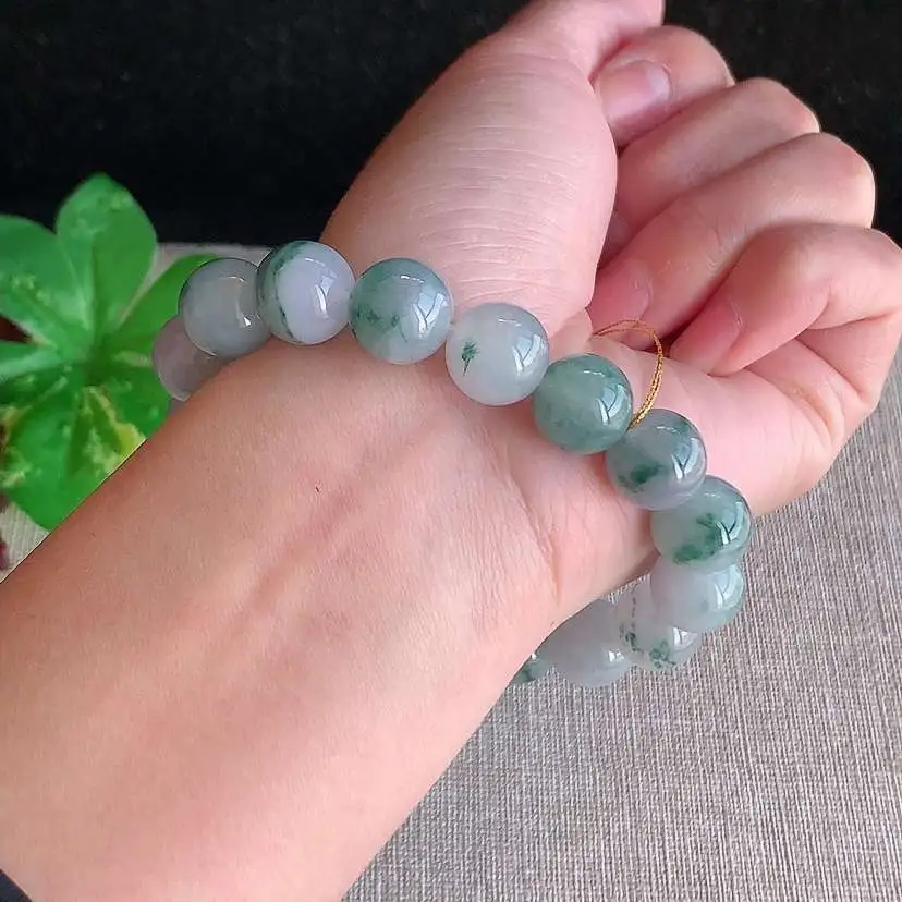 a货翡翠冰种飘花圆珠佛珠17颗  尺寸11.8mm 重量49.58g 0102