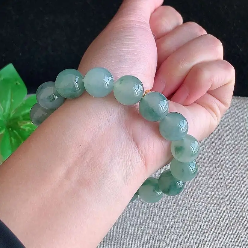 a货翡翠冰种飘花圆珠佛珠手串16颗  尺寸12.5mm 重量58.00g 0102