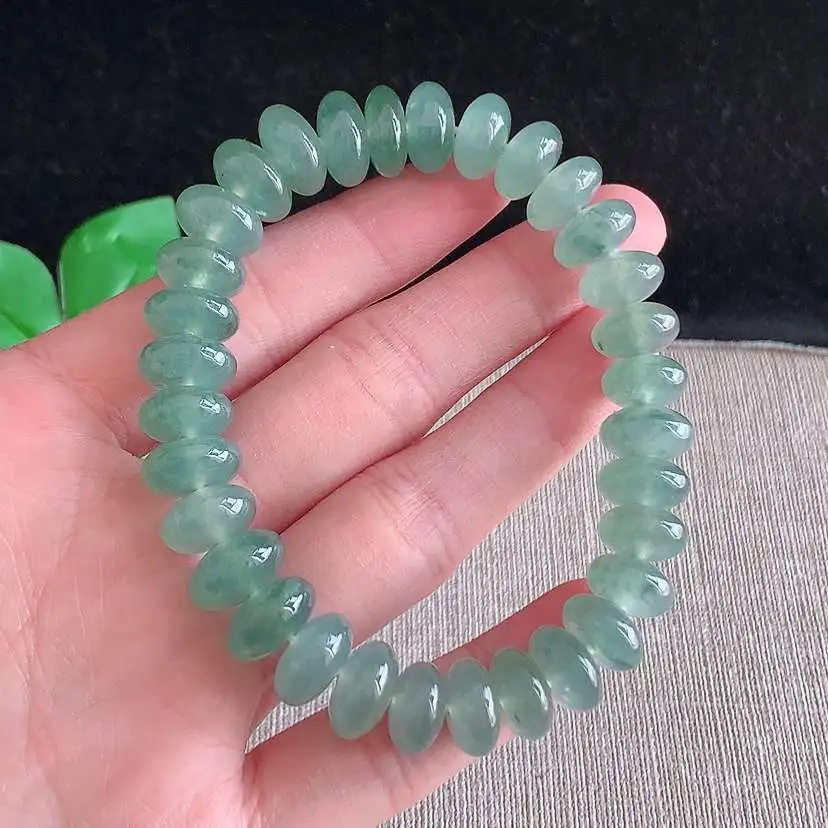 a货翡翠冰种晴水算盘珠手串32颗 尺寸10.7×5.4mm 重量46.00g 0104