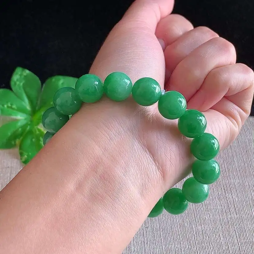 a货翡翠冰种满绿圆珠佛珠手串17颗  尺寸11.6mm 重量49.64g 0104