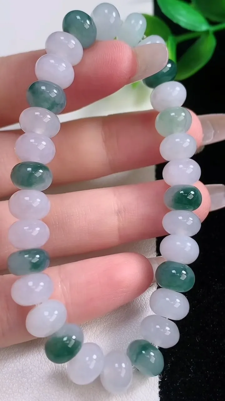 天然A货翡翠飘花算盘珠手串，尺寸8.5-6-30颗，重量:24.76g1月5日
工厂直销收藏佳品,种好水足，色泽均匀，有种有色，上手高大气！