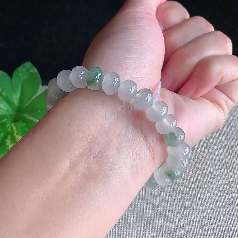 a货翡翠冰种飘花算盘珠手串25颗  尺寸9×6.3mm 重量27.65g 0104