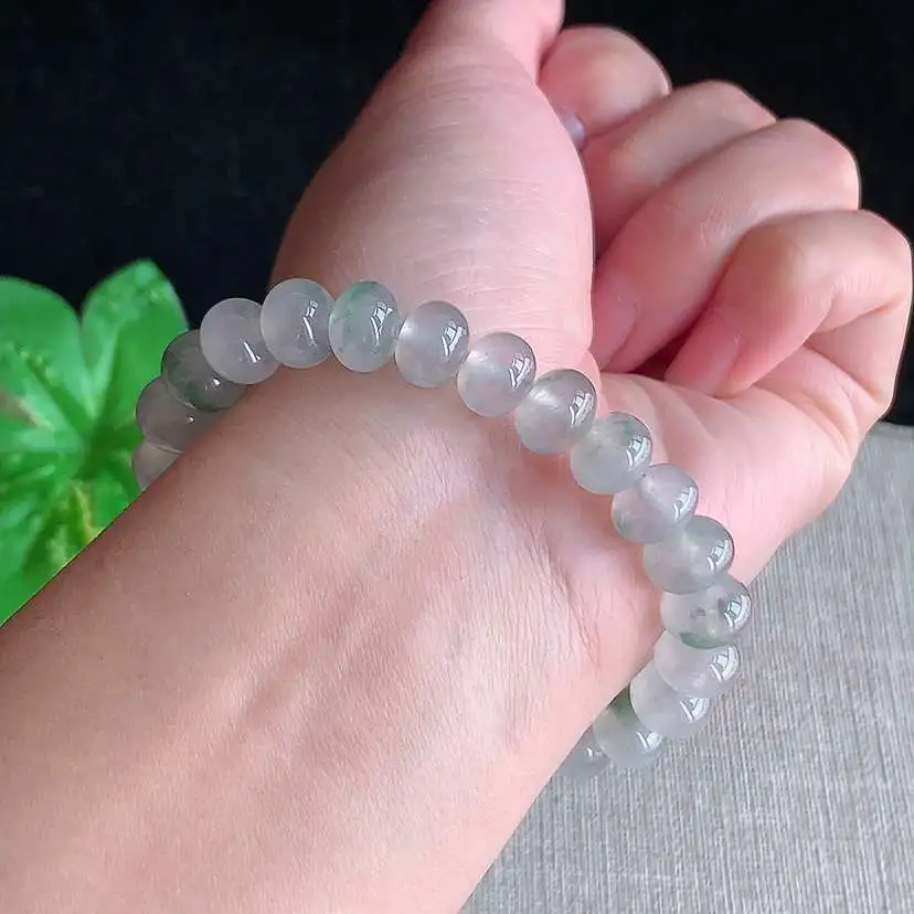 a货翡翠冰种飘花算盘珠手串25颗  尺寸9×6.3mm 重量27.65g 0104