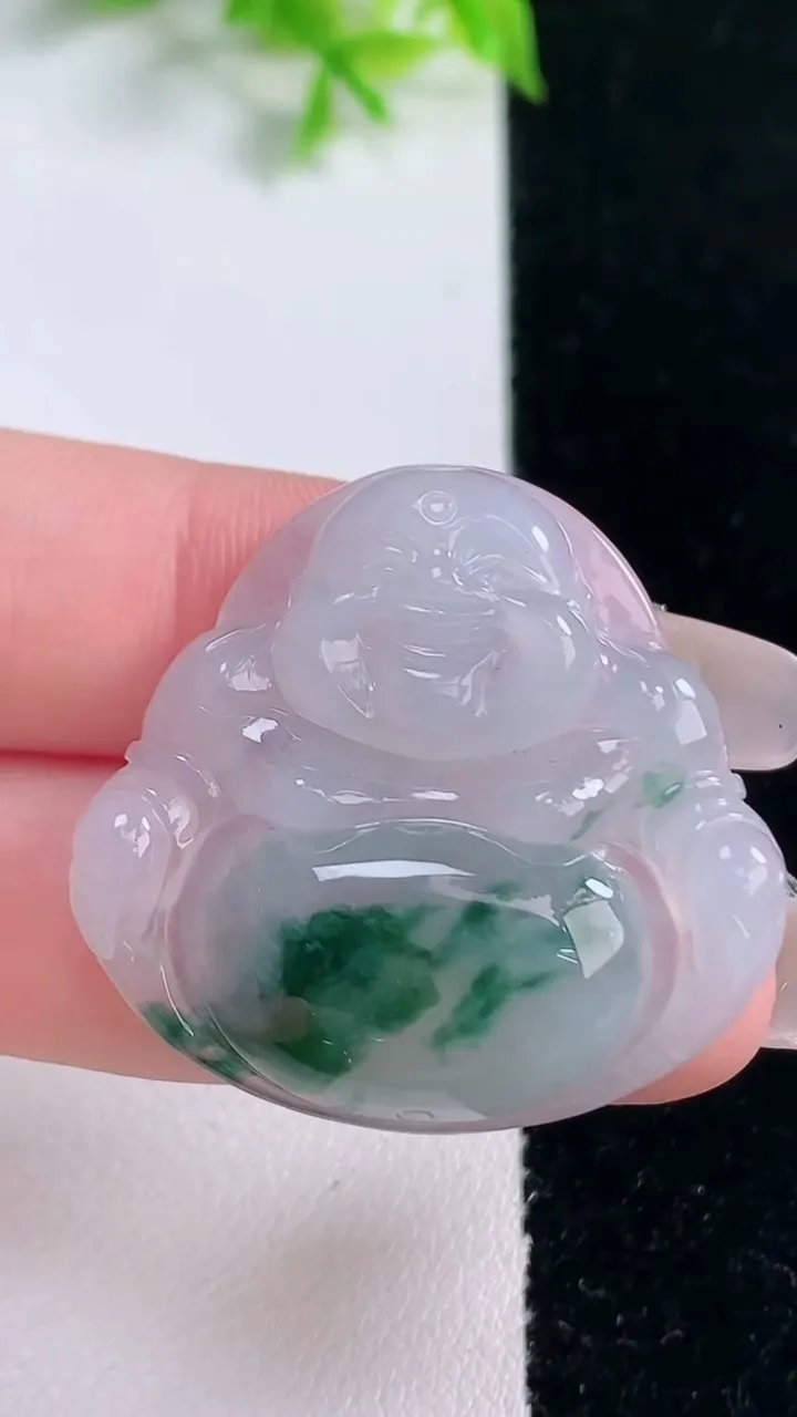 天然A货翡翠冰种飘花佛公吊坠，尺寸31.7-33.5-6.2，重量:10.25g
1月16日