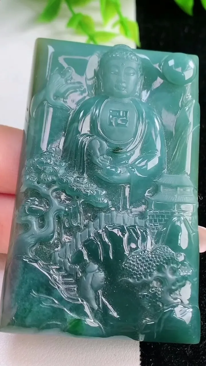 天然A货翡翠山水阿弥陀佛吊坠，尺寸69.7-43.5-6.8，重量:64.37g
1月16日