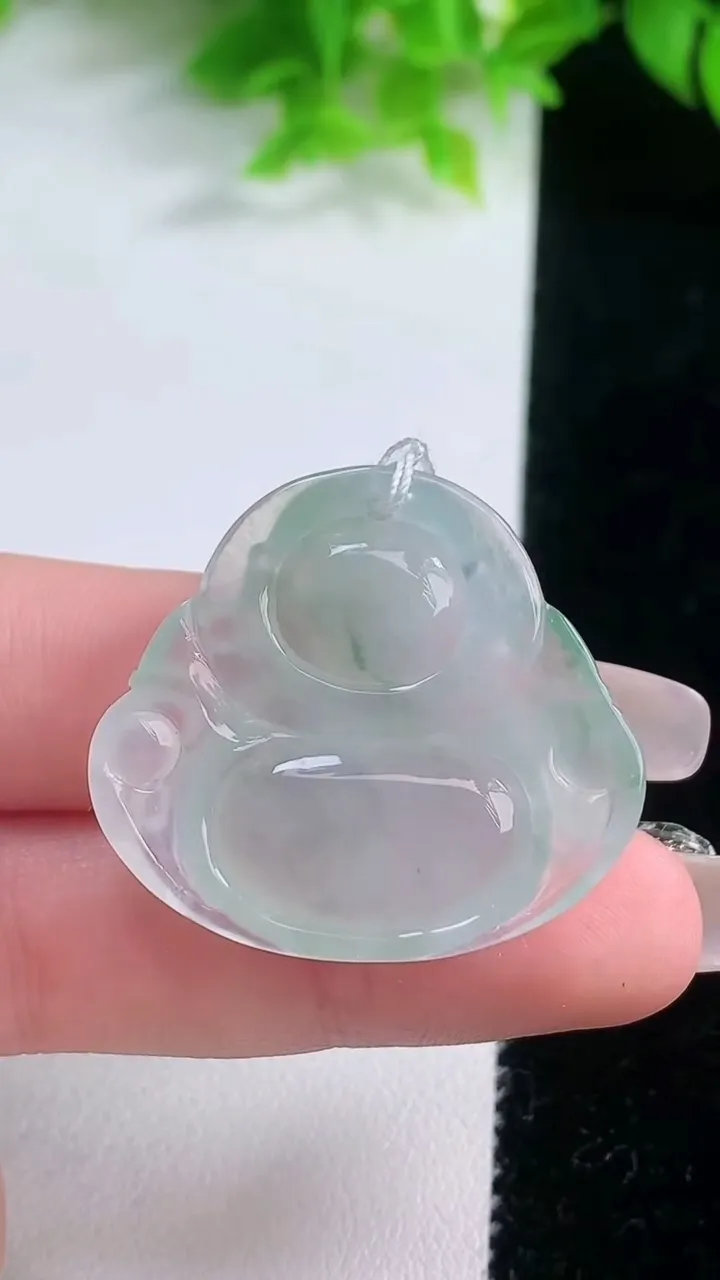 天然A货翡翠种飘花佛公吊坠，尺寸33.4-36-6.3，重量:11.59g
1月19日