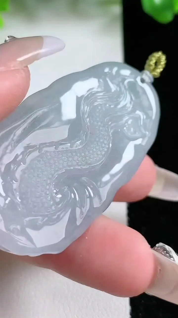 天然A货翡翠御龙不动明王吊坠，尺寸52.3-28-6.6，重量:20.31g
1月20日