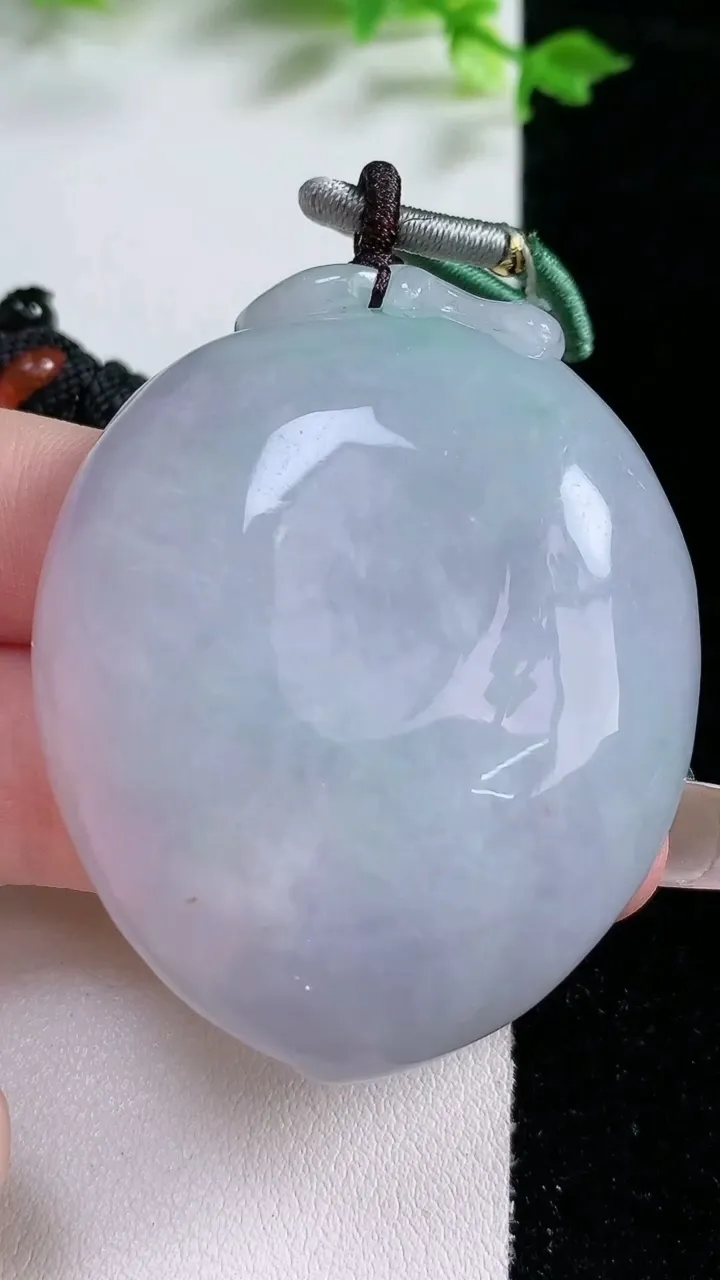 天然A货翡翠紫罗兰寿桃吊坠，尺寸62-43-12.5，重:56.98g
1月20日