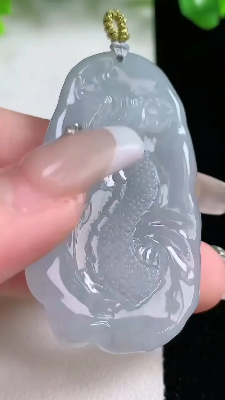 天然A货翡翠御龙不动明王吊坠，尺寸52.3-28-6.6，重量:20.31g
1月20日