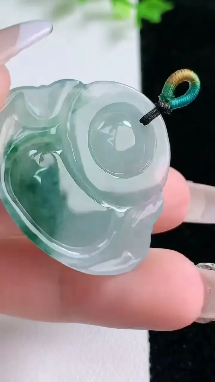 天然A货翡翠冰种飘花佛公吊坠，尺寸30.6-34.6-6，重量:9.41g
1月20日