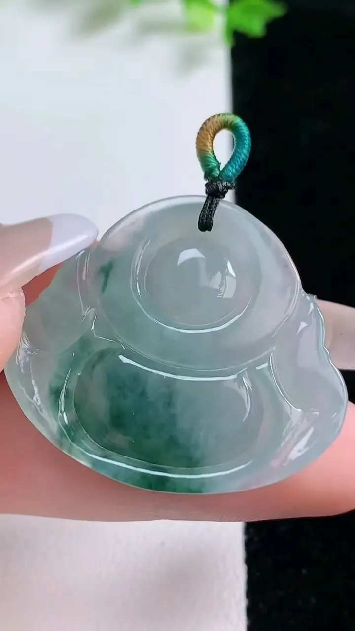 天然A货翡翠冰种飘花佛公吊坠，尺寸30.6-34.6-6，重量:9.41g
1月20日