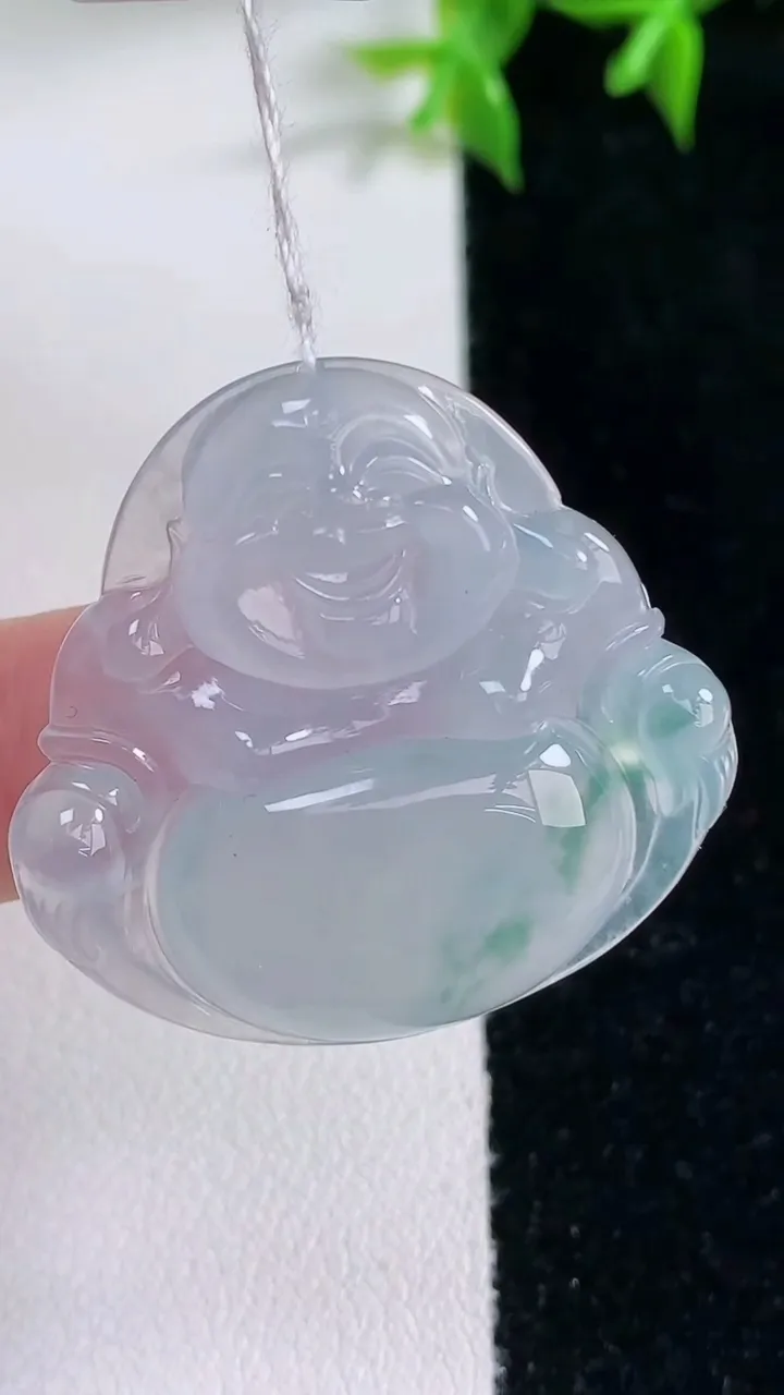 天然A货翡翠冰种飘花佛公吊坠，尺寸30.6-33-5.4，重量:8.44g
1月22日