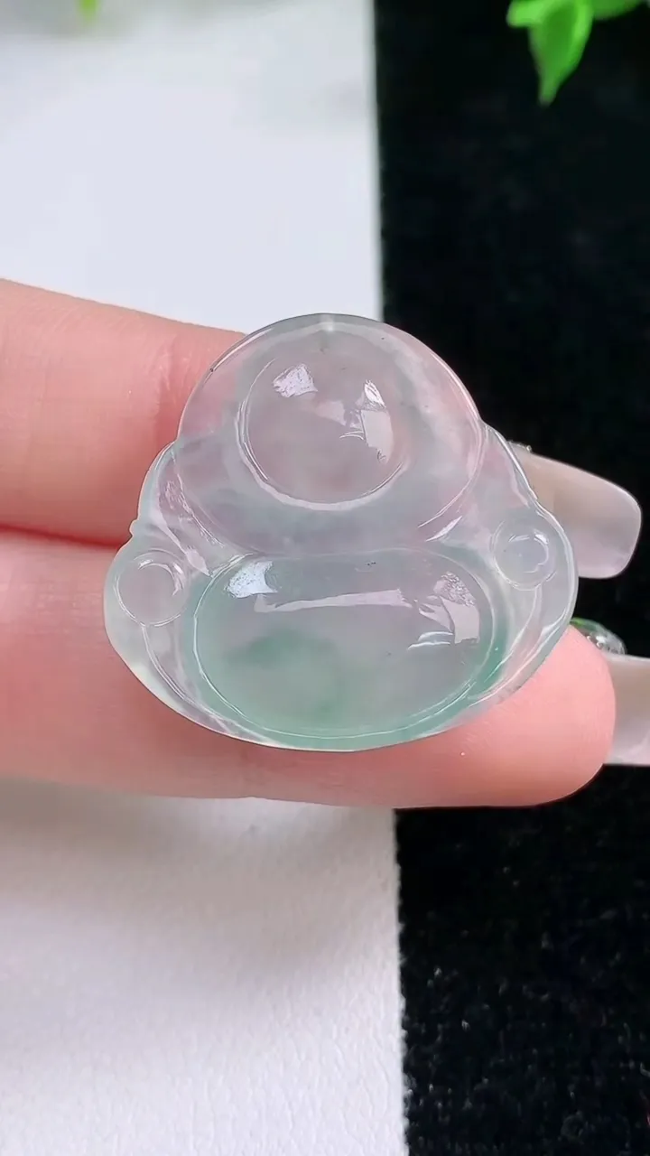 天然A货翡翠冰种飘花佛公吊坠，尺寸26.6-28.7-4.8，重量:5.67g
1月22日