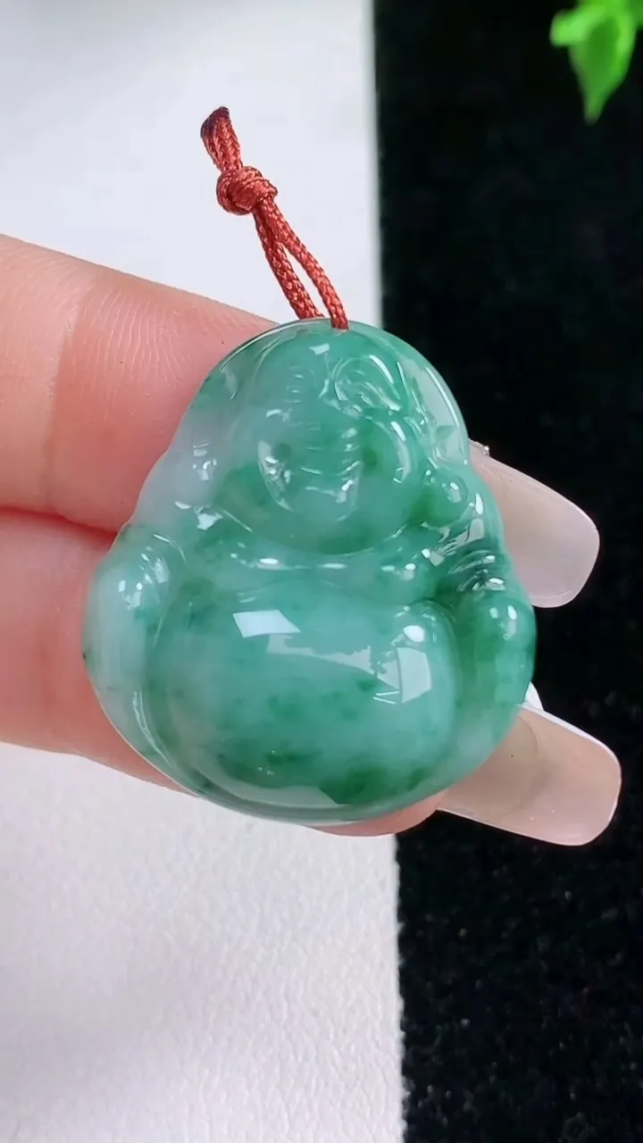 天然A货翡翠飘花佛公吊坠，尺寸28-24.5-6，重量:6.96g
1月22日