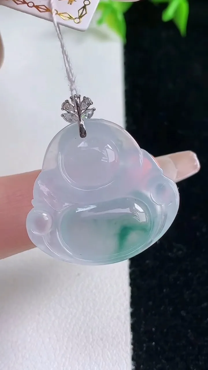 天然A货翡翠种飘花佛公吊坠，尺寸23.7-25.7-5.8，重量:5.46g
1月22日