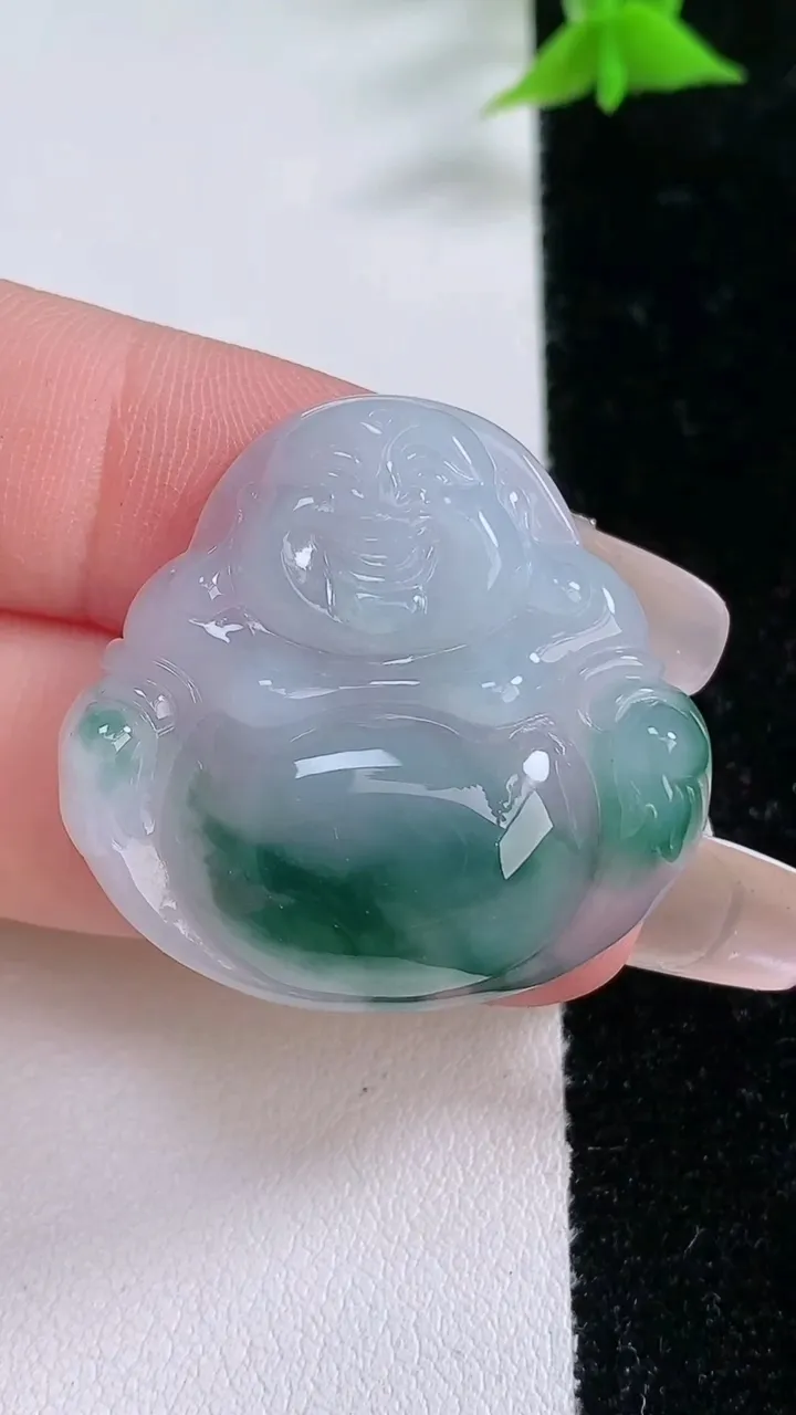 天然A货翡翠飘花佛公吊坠，尺寸29.5-30.8-6.6，重:9.40g
1月25日