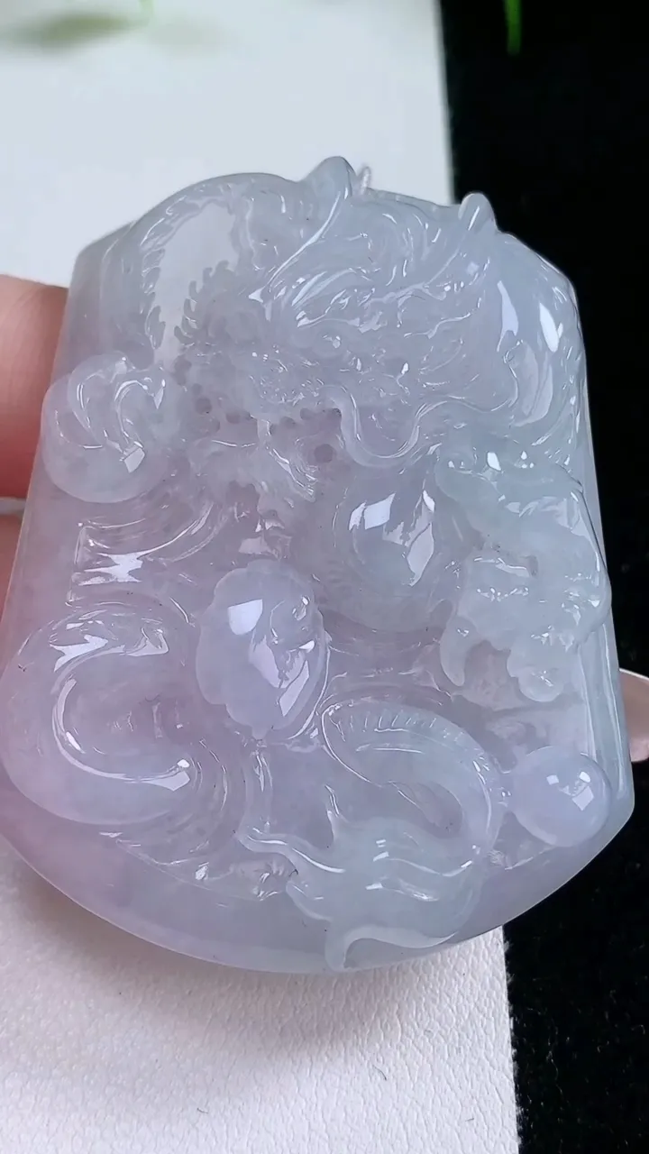 天然A货翡翠紫罗兰龙牌吊坠，尺寸56.4-44.7-7.4，重量:39.02g
1月26日