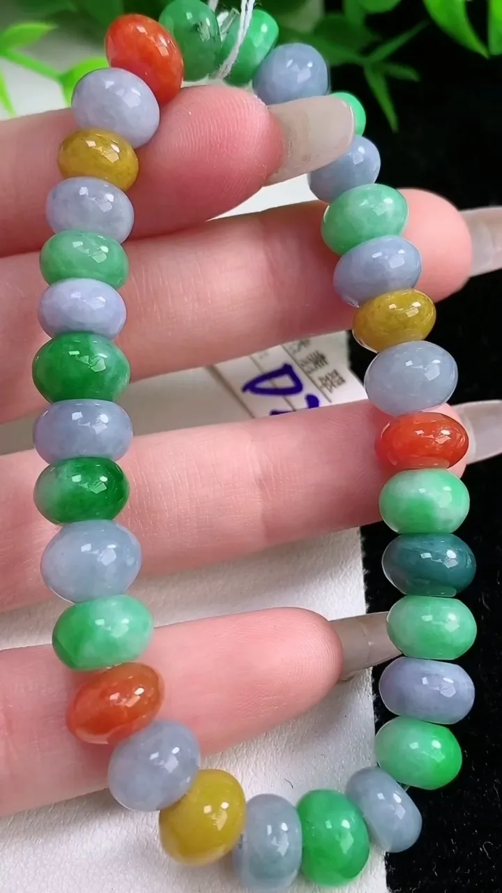 天然A货翡翠四彩算盘珠手串，尺寸9.4-4.8-32颗，重量:29.24g1月26日
工厂直销收藏佳