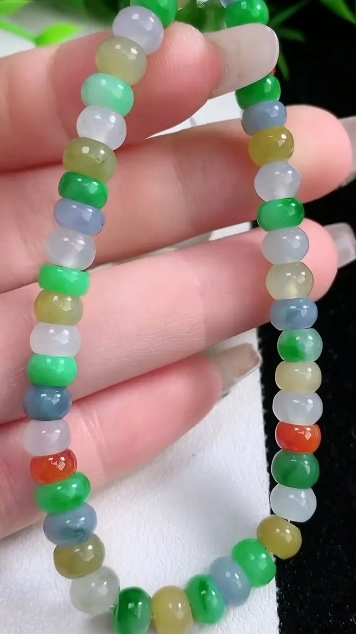天然A货翡翠四彩算盘珠手串，尺寸6.4-4.5-45颗，重量:14.78g1月26日
工厂直销收藏佳品,种好水足，色泽均匀，有种有色，上手高大气！