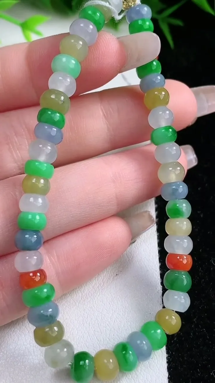 天然A货翡翠四彩算盘珠手串，尺寸6.4-4.5-45颗，重量:14.78g1月26日
工厂直销收藏佳品,种好水足，色泽均匀，有种有色，上手高大气！