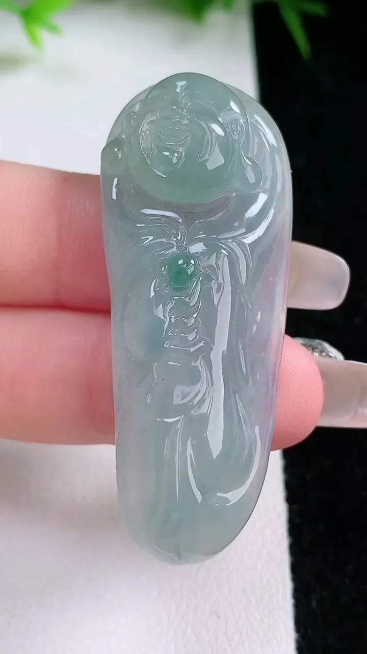 天然A货翡翠飘花逍遥佛吊坠，尺寸50.5-19.8-6.7，重量:14.57g
1月26日