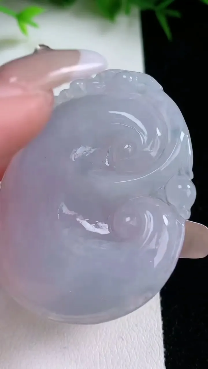 天然A货翡翠紫罗兰如意吊坠，尺寸52.6-40.8-5.4，重量:21.86g
1月26日