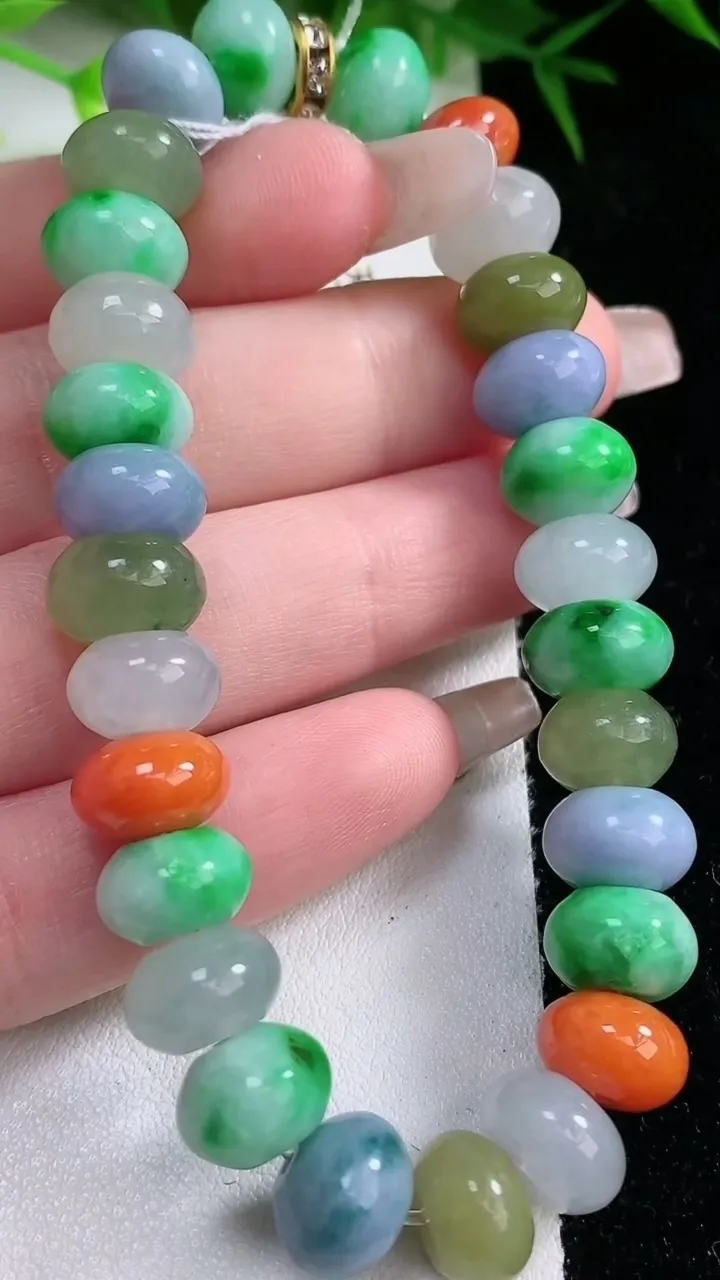 天然A货翡翠四彩算盘珠手串，尺寸10-5.8-28颗，重量:35.42g1月26日
工厂直销收藏佳品,种好水足，色泽均匀，有种有色，上手高大气！