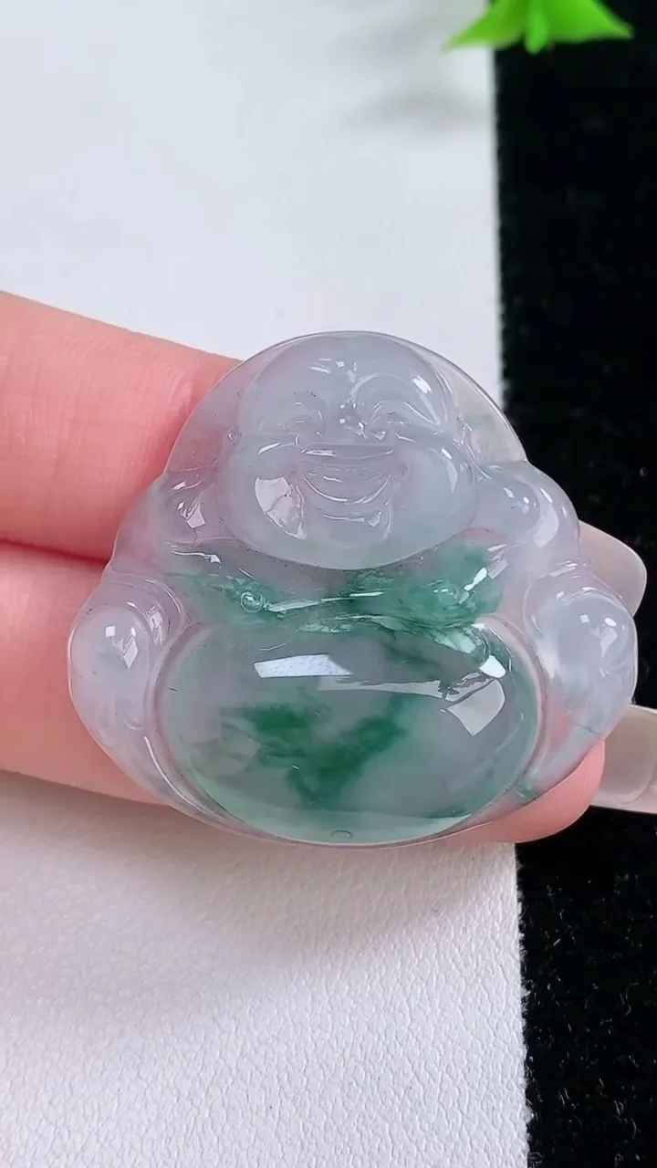 天然A货翡翠种飘花佛公吊坠，尺寸33.5-36-6，重量:10.35g
1月27日