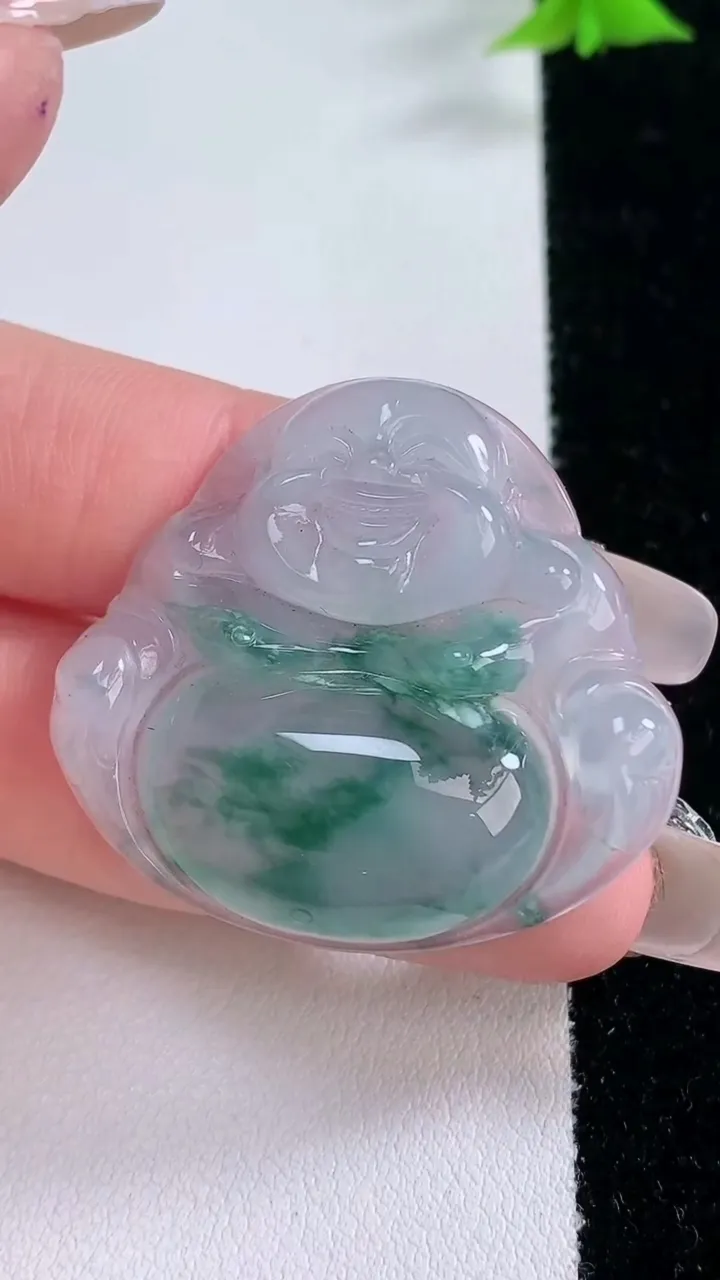 天然A货翡翠种飘花佛公吊坠，尺寸33.5-36-6，重量:10.35g
1月27日