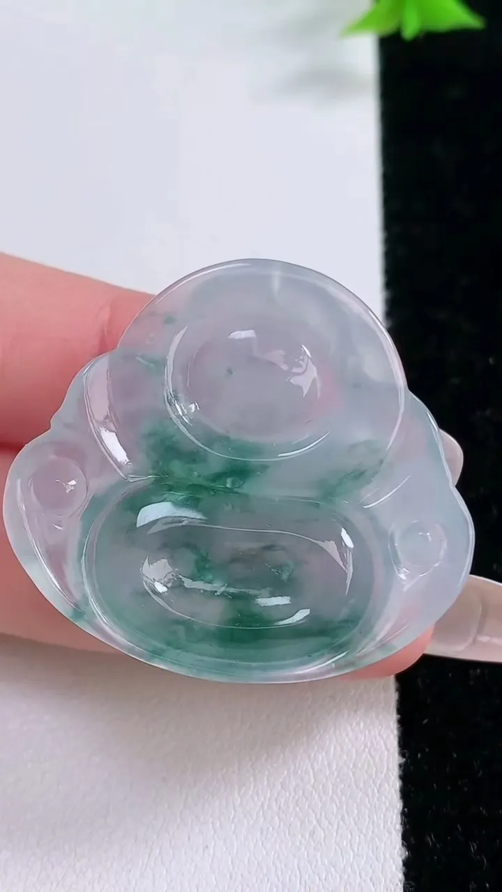 天然A货翡翠种飘花佛公吊坠，尺寸33.5-36-6，重量:10.35g
1月27日