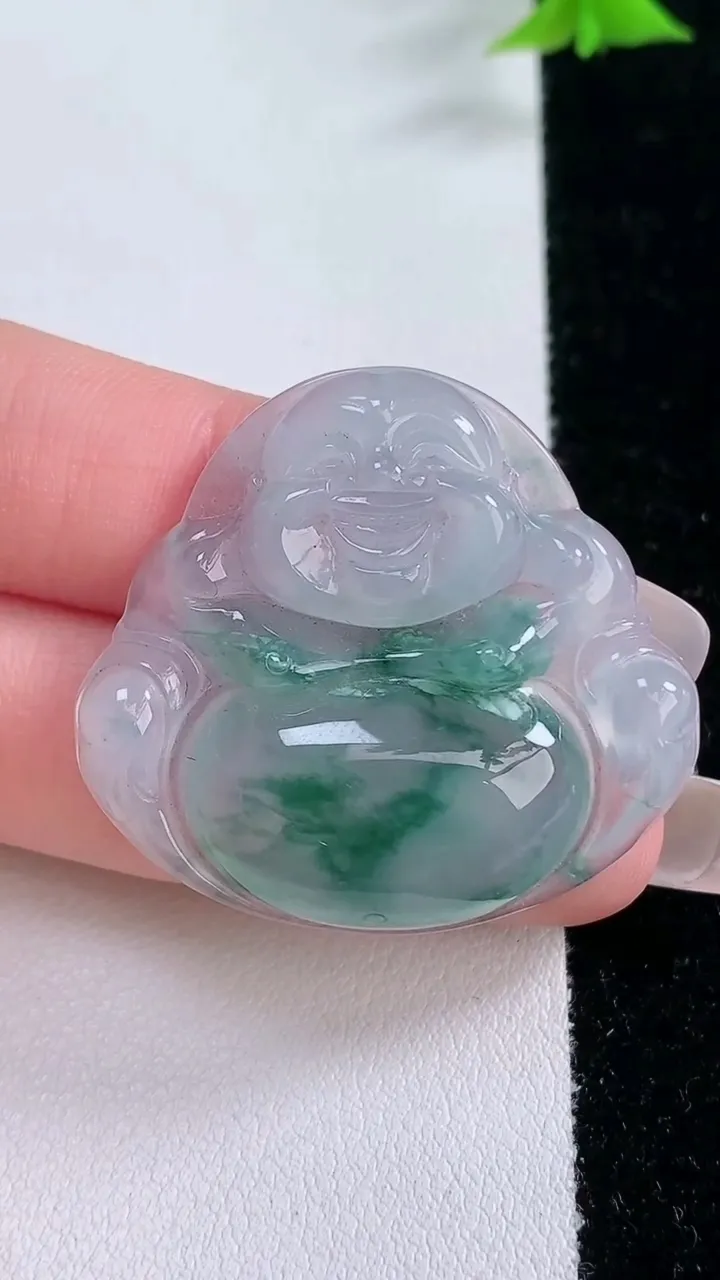 天然A货翡翠种飘花佛公吊坠，尺寸33.5-36-6，重量:10.35g
1月27日