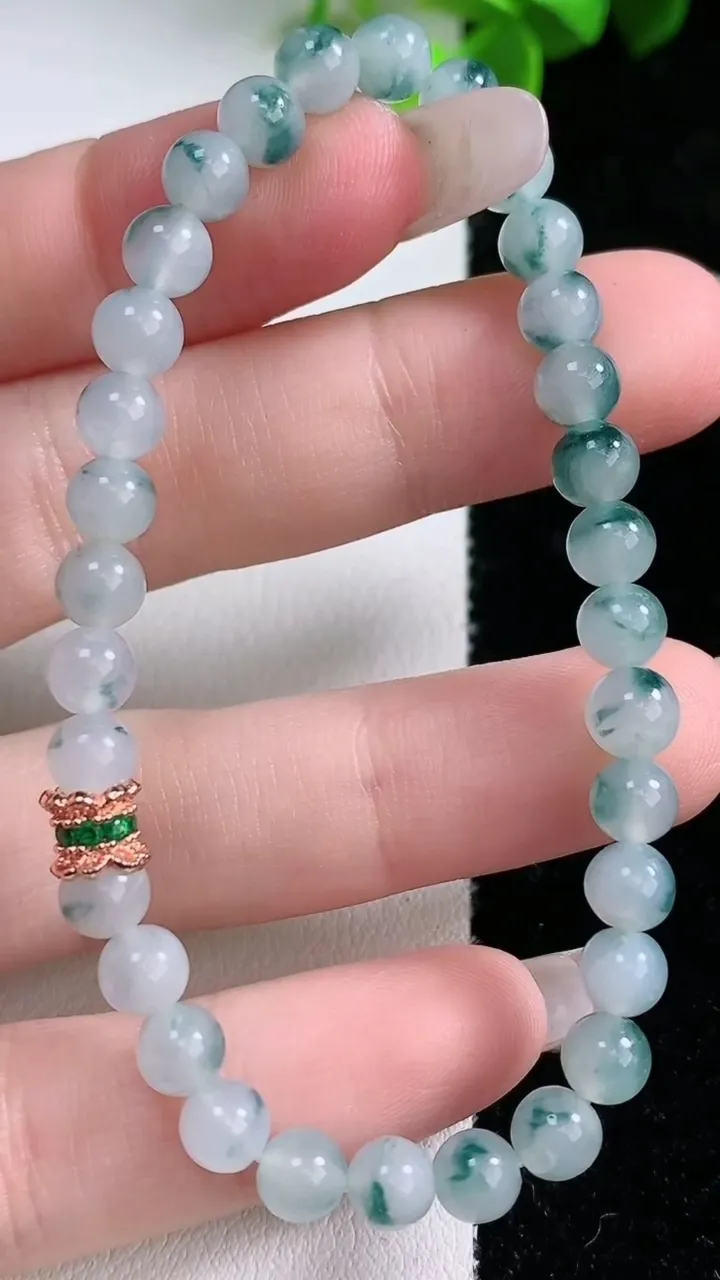 天然A货翡翠飘花圆珠手串，尺寸5.3-32颗，重量:8.80g1月29日
工厂直销收藏佳品,种好水足，色泽均匀，有种有色，上手高大气！