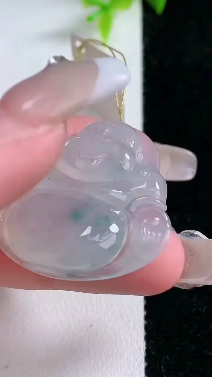 天然A货翡翠种飘花佛公吊坠，尺寸31.7-35-6.5，重量:11.52g
1月30日