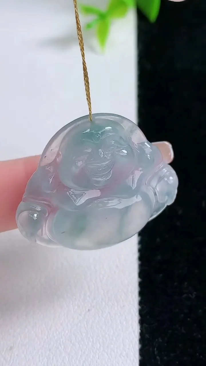 天然A货翡翠种飘花佛公吊坠，尺寸34.6-37.6-10.7，重量:8.09g
1月30日