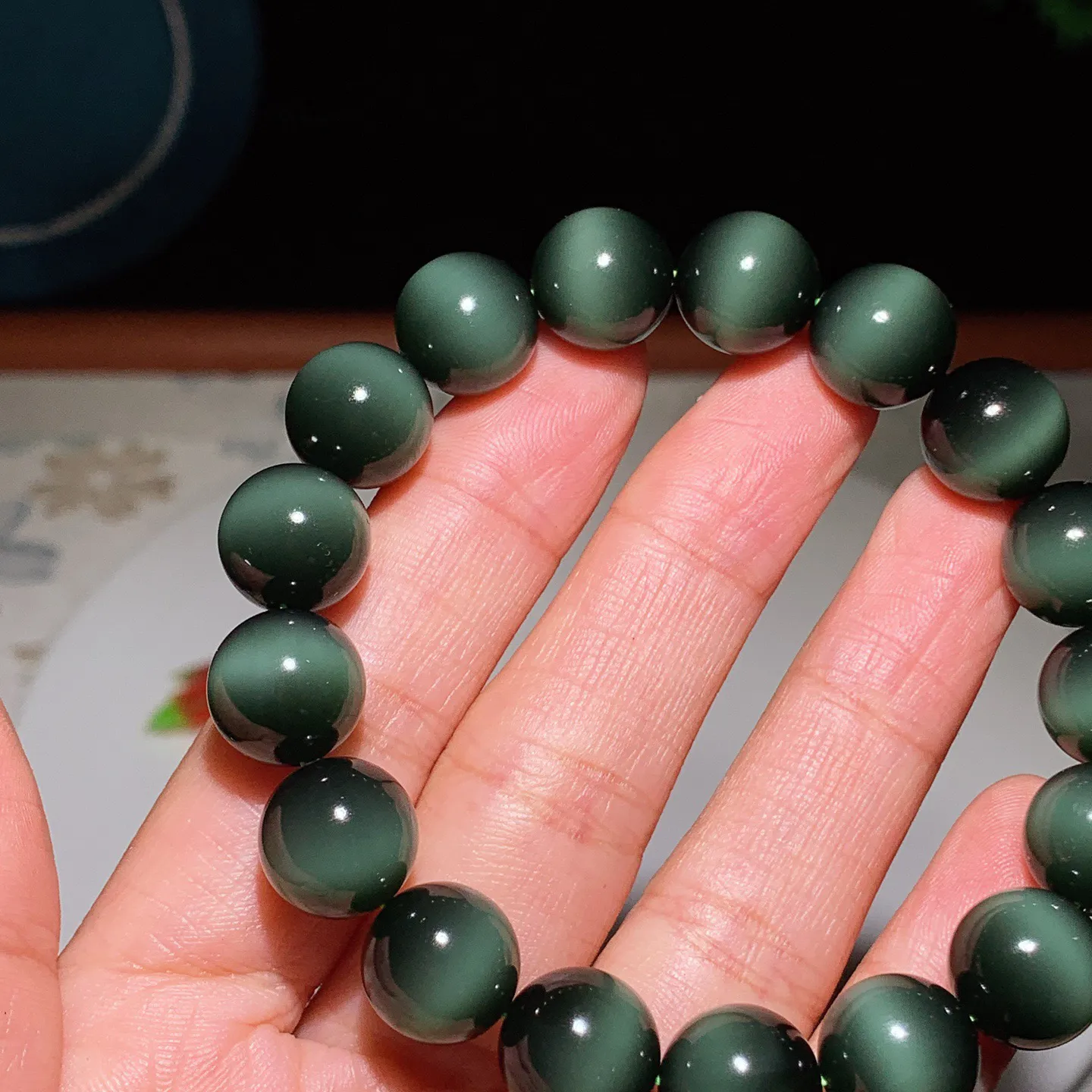 臻品收藏级新疆和田玉黑猫眼猫眼碧玉手串 一线天黑猫手串 单颗尺寸12！无裂无杂玉质细腻油润 底色纯净 脂粉好，品质好。lt250103