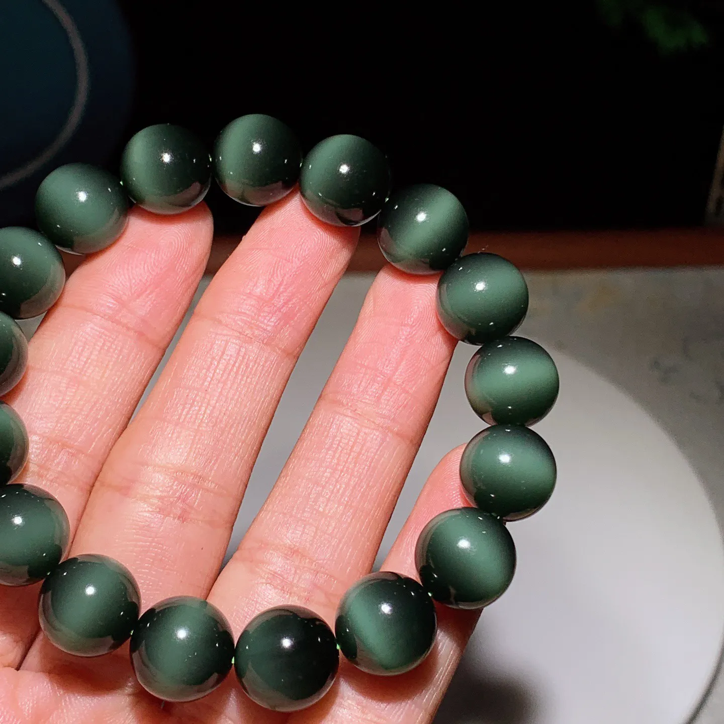 臻品收藏级新疆和田玉黑猫眼猫眼碧玉手串 一线天黑猫手串 单颗尺寸12！无裂无杂玉质细腻油润 底色纯净 脂粉好，品质好。lt250103