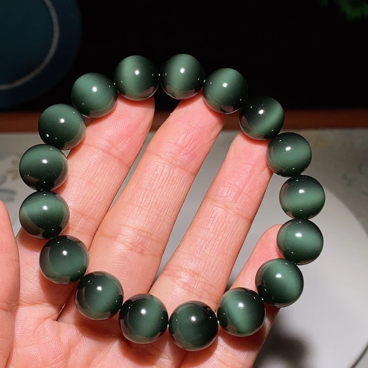 臻品收藏级新疆和田玉黑猫眼猫眼碧玉手串 一线天黑猫手串 单颗尺寸12！无裂无杂玉质细腻油润 底色纯净 脂粉好，品质好。lt250103